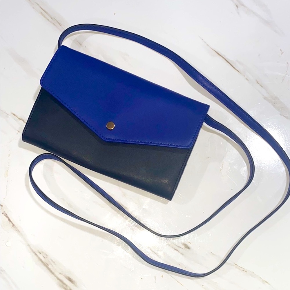 Sleek Blue and‎ Black Crossbody Bag with Minimalist Design
